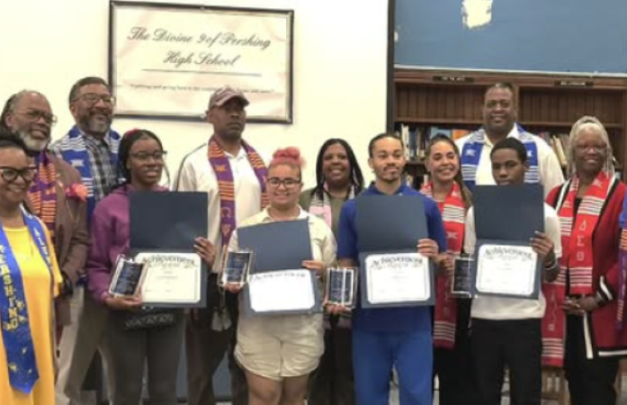Students with Staff members in Library